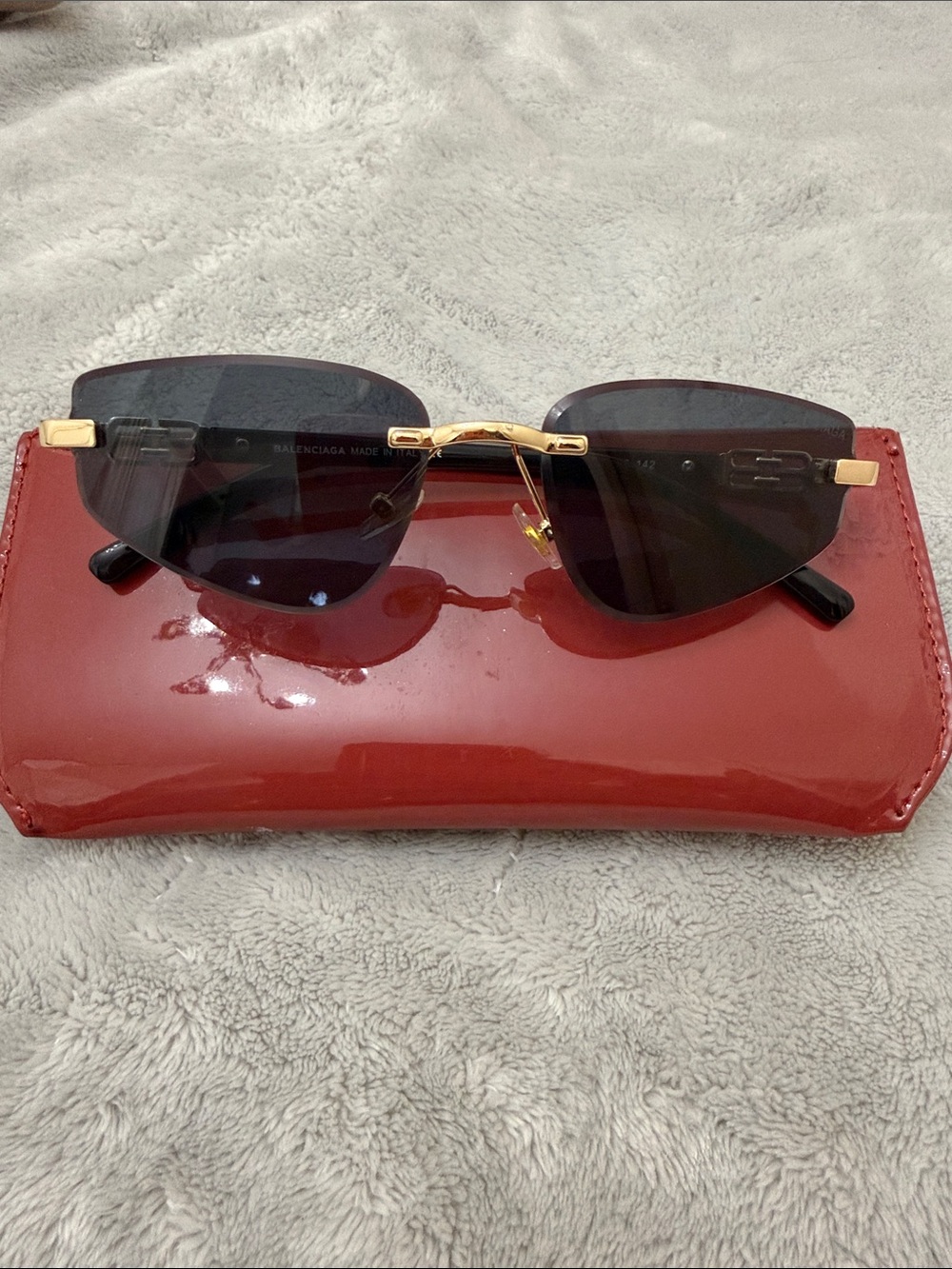 Balenciaga Men’s Rimless Sunglasses in Black and Gold